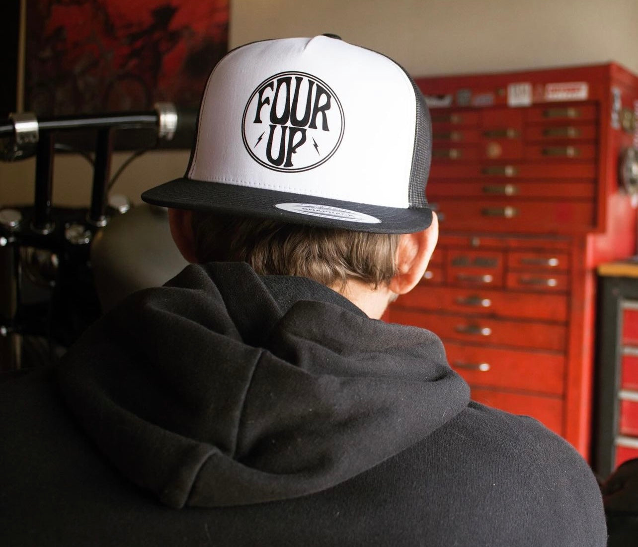 Four Logo Trucker Hat